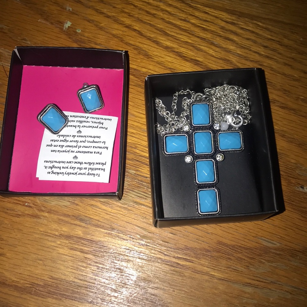 Cross necklace, with matching earrings.